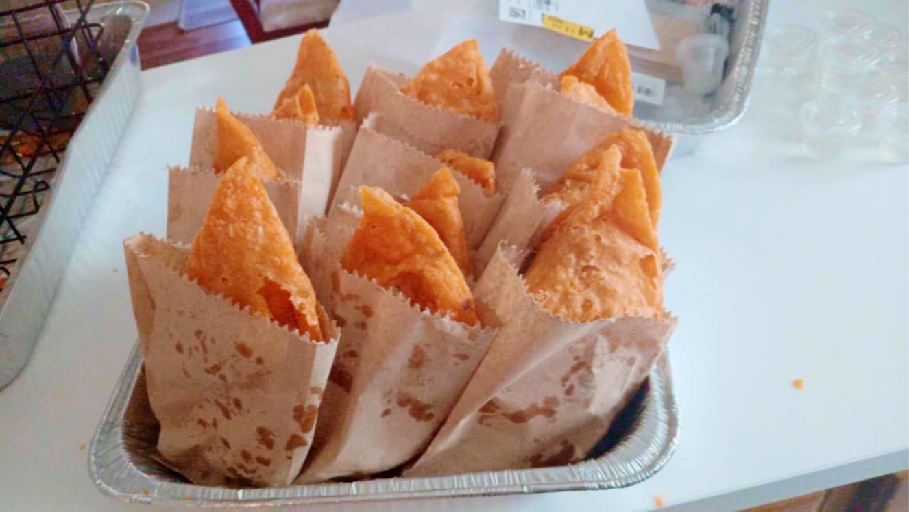 Wrapped empanadas in tray