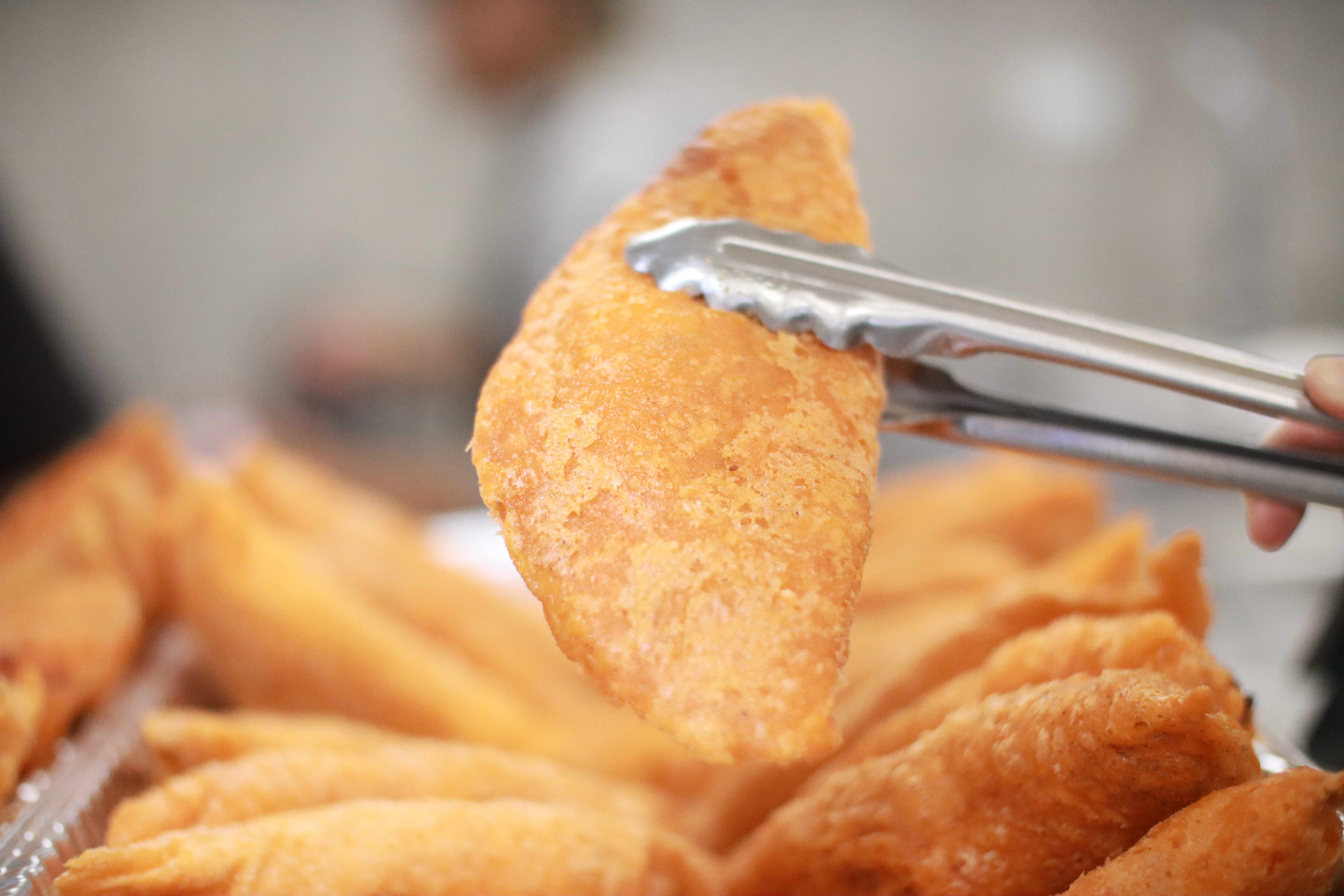 Single empanada showcasing crispy texture